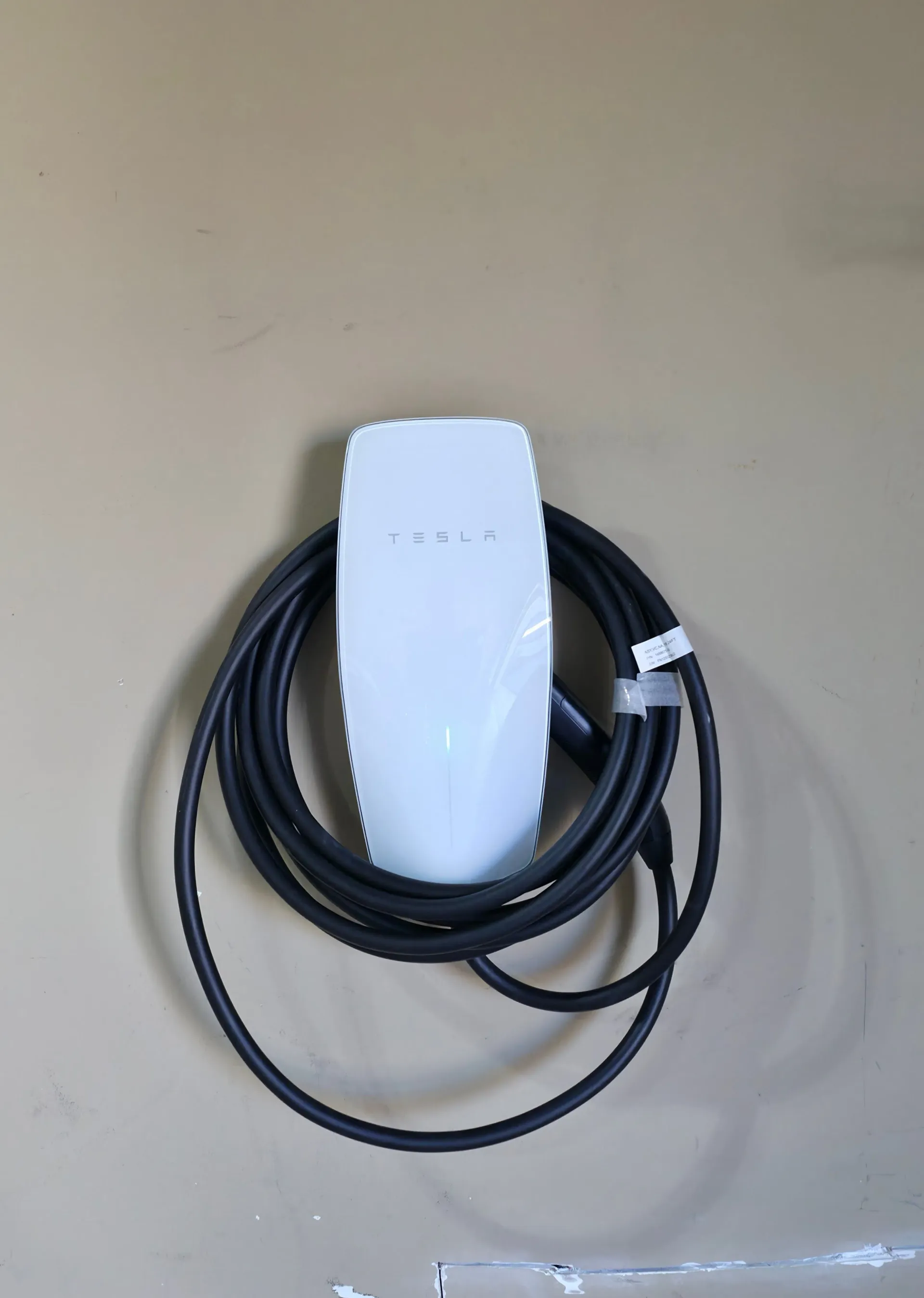 Universal Tesla Wall Connector installed in an Ashburn, Virginia home