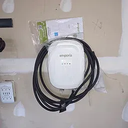 Emporia Level 2 charger installed on a residential wall