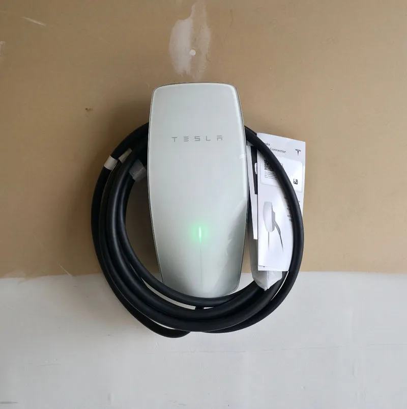 Tesla Wall Connector mounted neatly on a residential garage wall