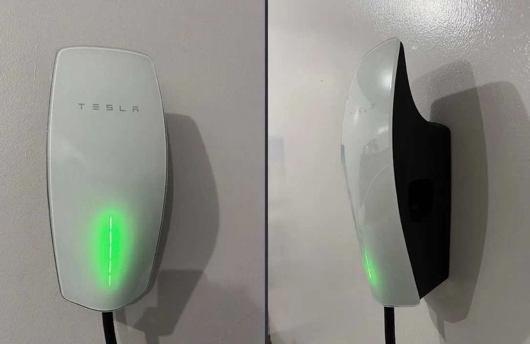Tesla Wall Connector shown from the front and side after installation